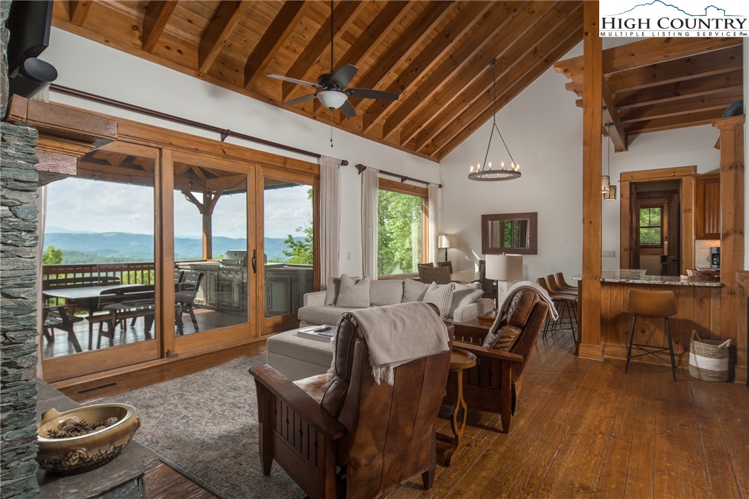 153 Stonecrop Lane Boone, NC 28607 - Photo 5 of 49 a living room with furniture and a large window