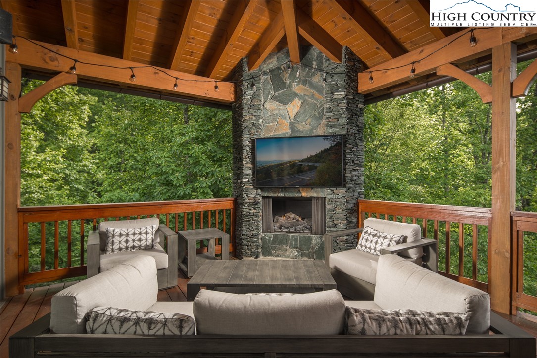 153 Stonecrop Lane Boone, NC 28607 - Photo 6 of 49 a view of a couches in the patio