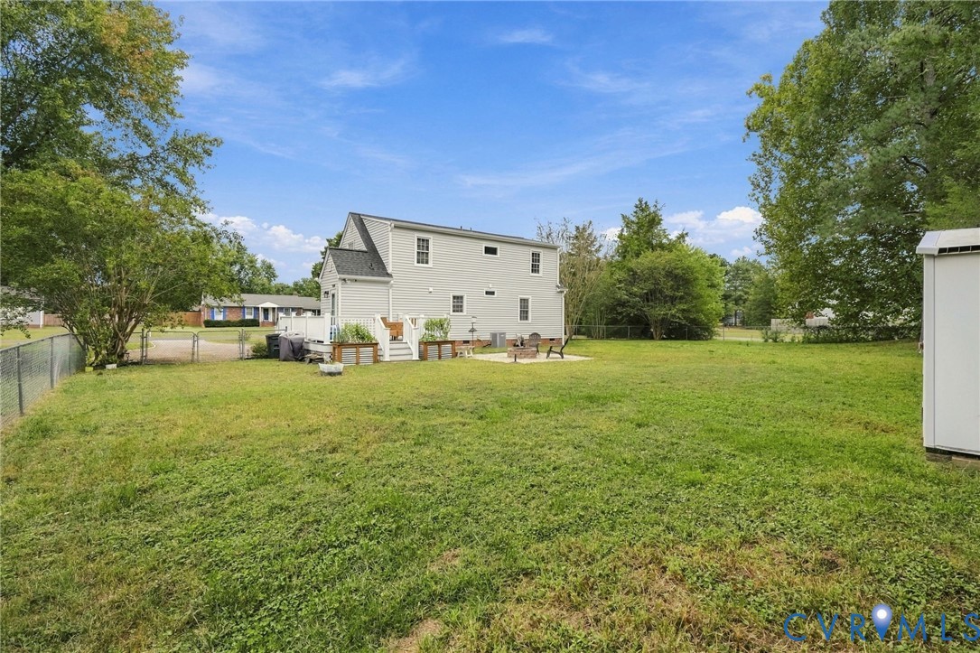 194 Poplar Road Aylett, VA 23009 - Photo 40 of 48 Expansive grassy yard with mature trees, a multi-l