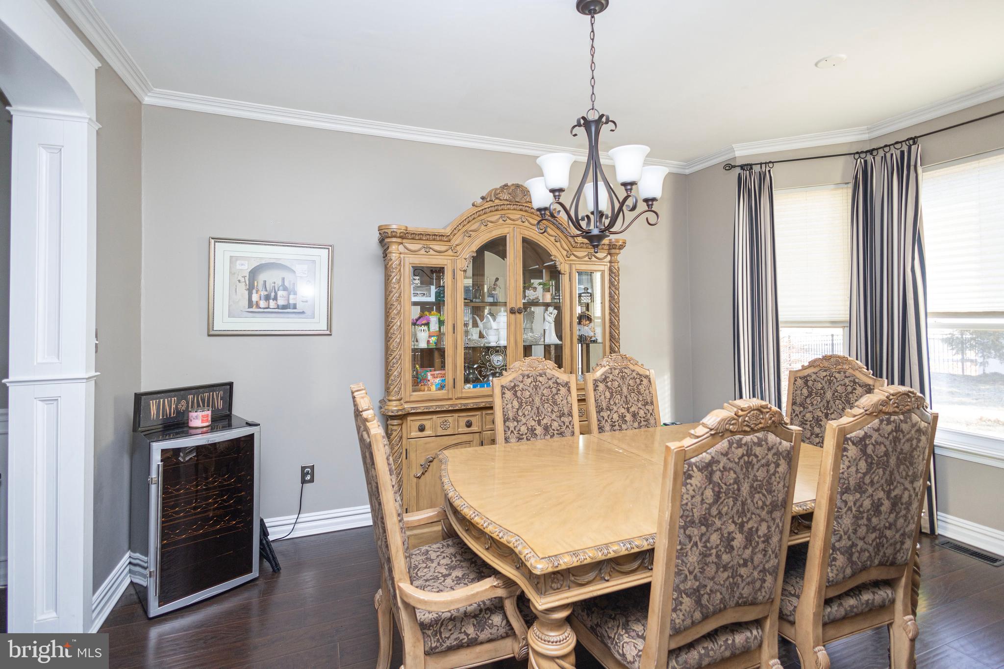 317 Pickwick Drive Williamstown, NJ 08094 - Photo 18 of 52 a view of a dining room with furniture window and wooden floor