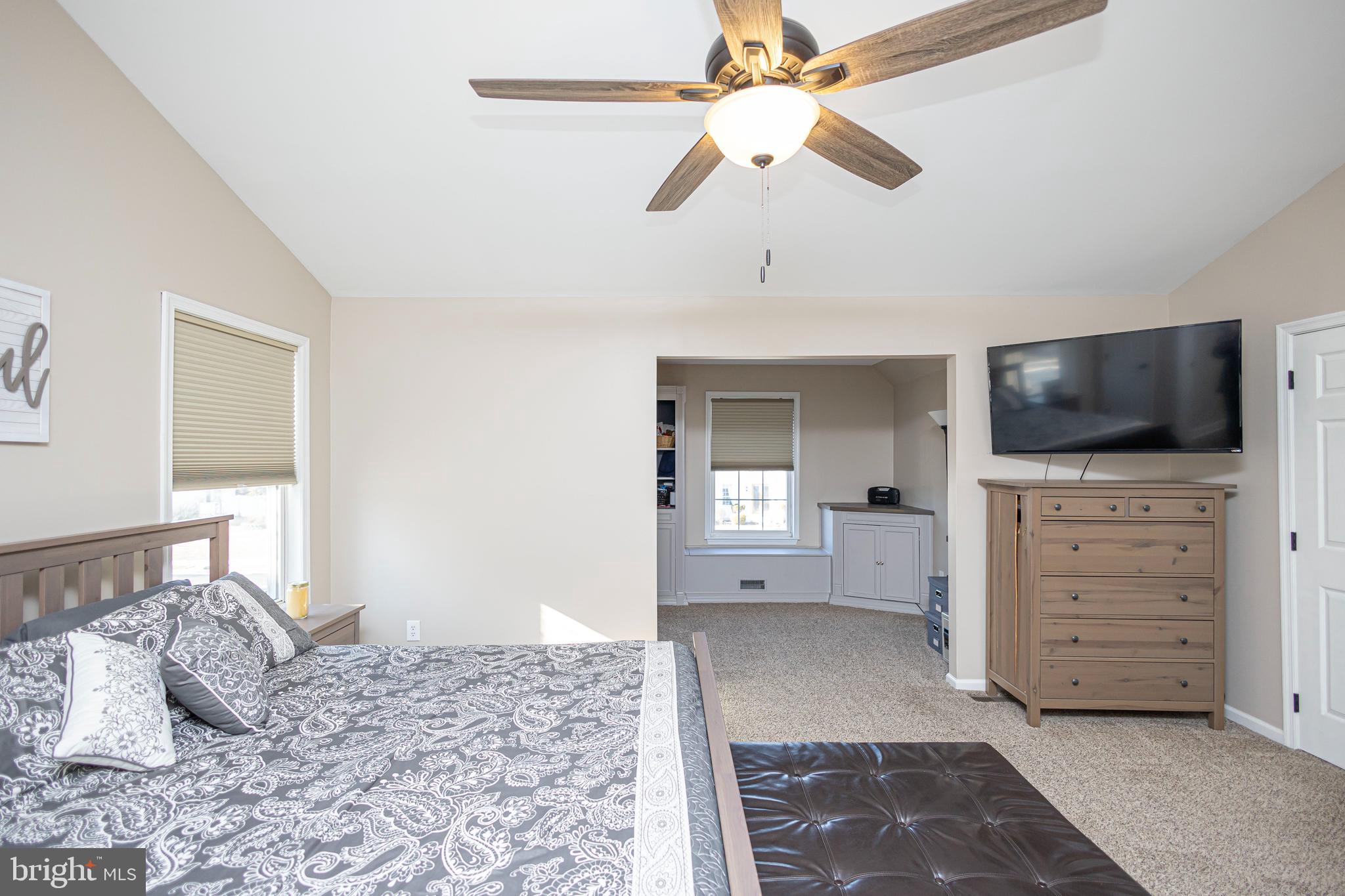 317 Pickwick Drive Williamstown, NJ 08094 - Photo 25 of 52 a bedroom with a bed and a flat screen tv
