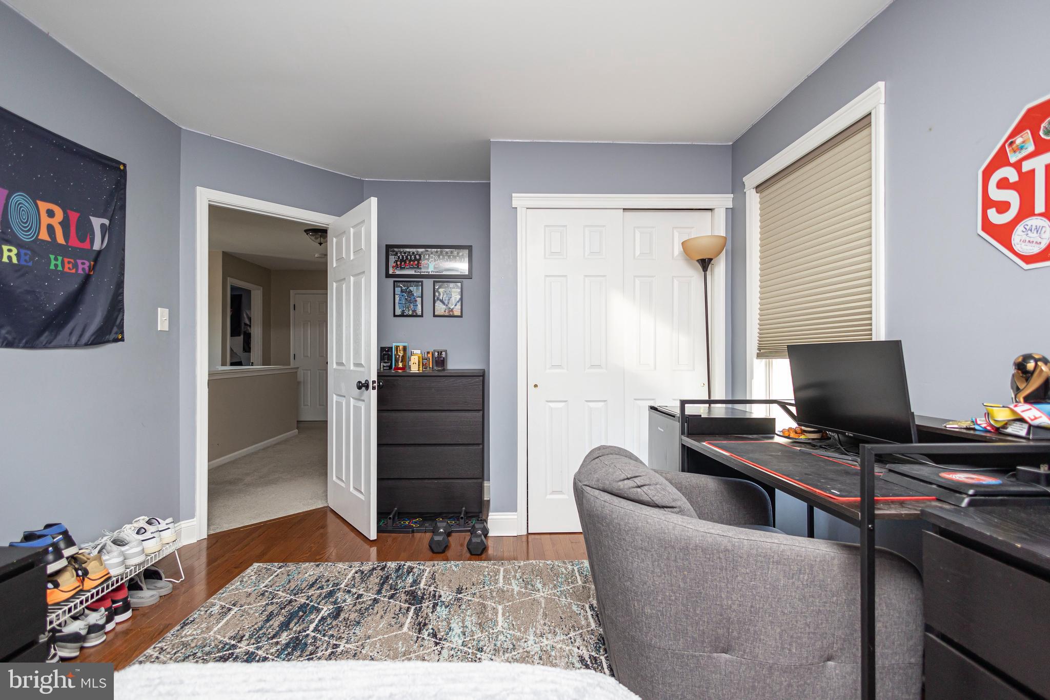317 Pickwick Drive Williamstown, NJ 08094 - Photo 35 of 52 a living room with furniture and a flat screen tv
