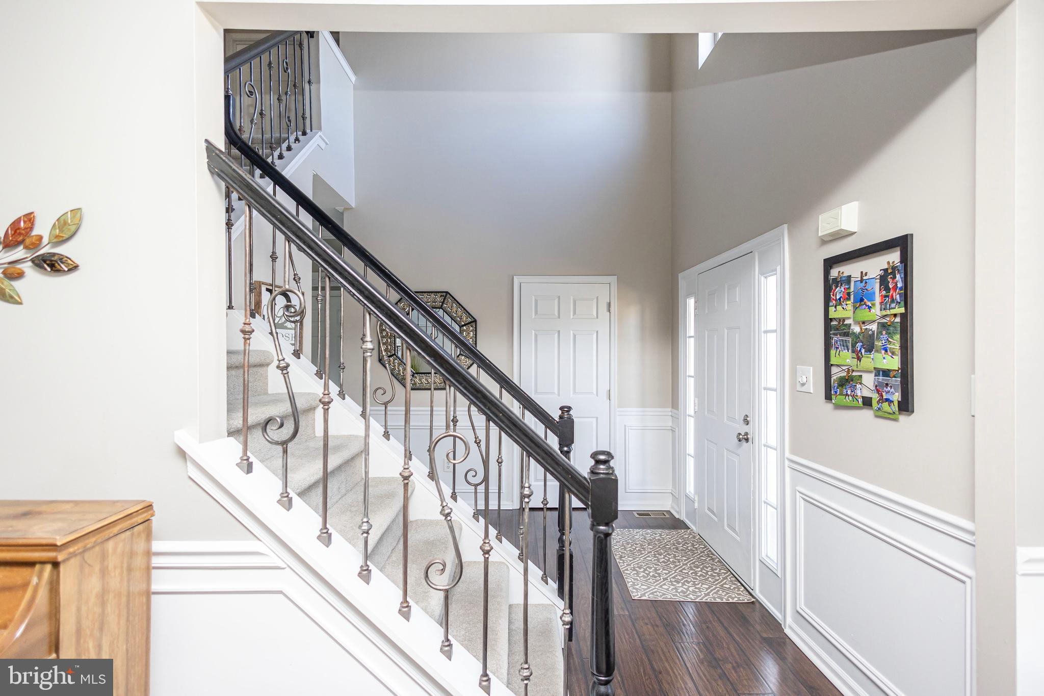 317 Pickwick Drive Williamstown, NJ 08094 - Photo 4 of 52 a view of entryway and hall with wooden floor