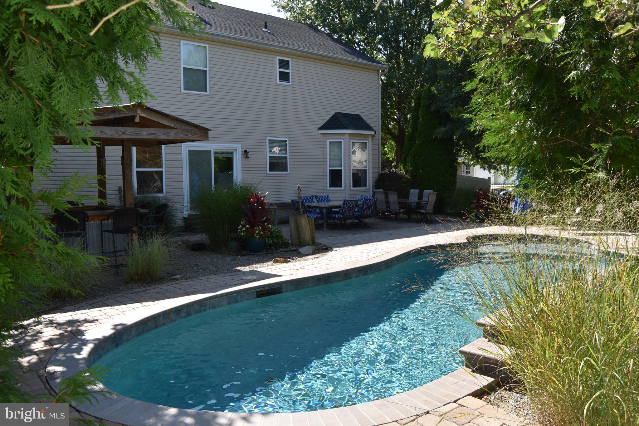 317 Pickwick Drive Williamstown, NJ 08094 - Photo 42 of 52 a view of a house with pool