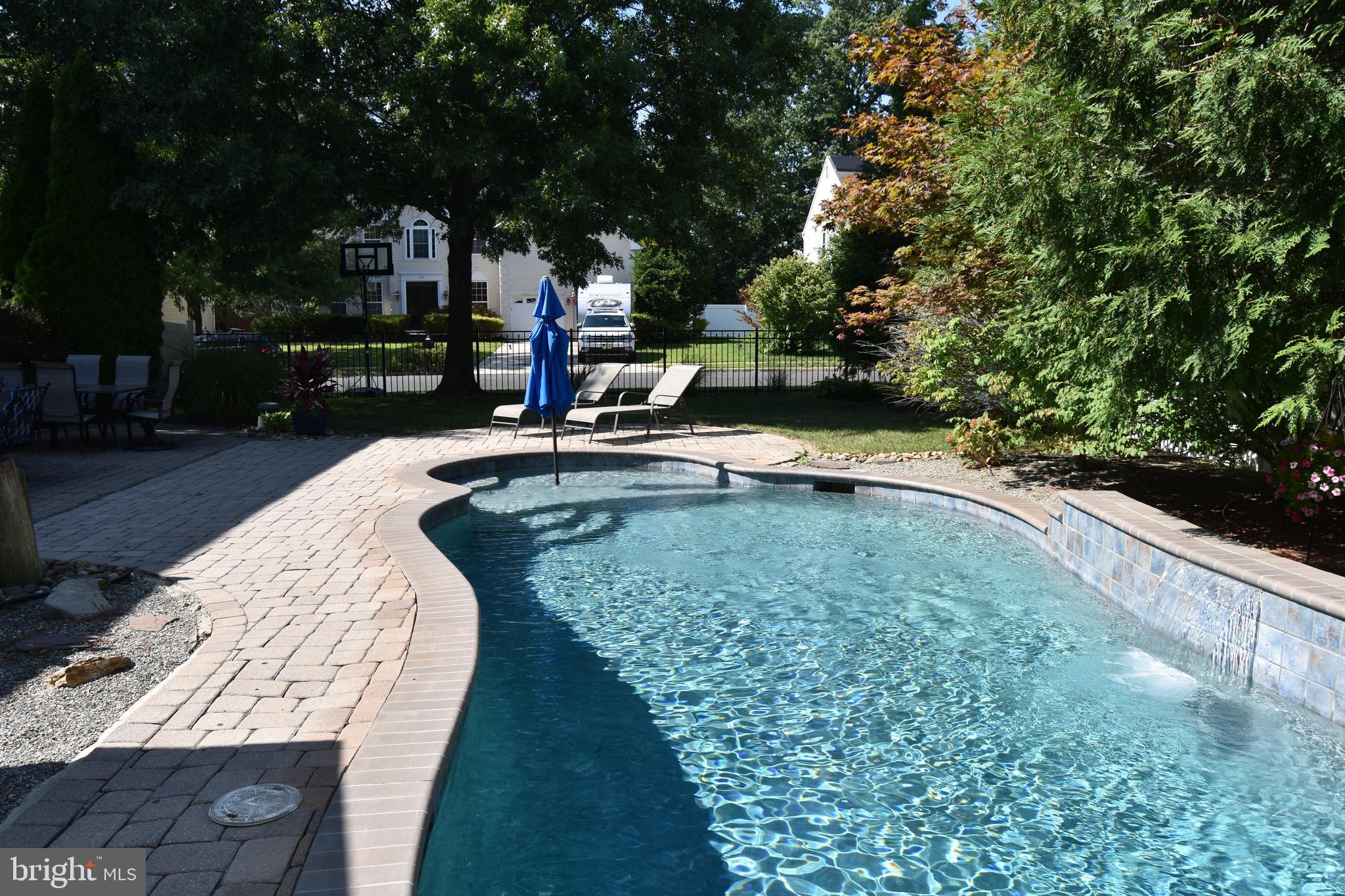 317 Pickwick Drive Williamstown, NJ 08094 - Photo 44 of 52 a view of a swimming pool with a patio