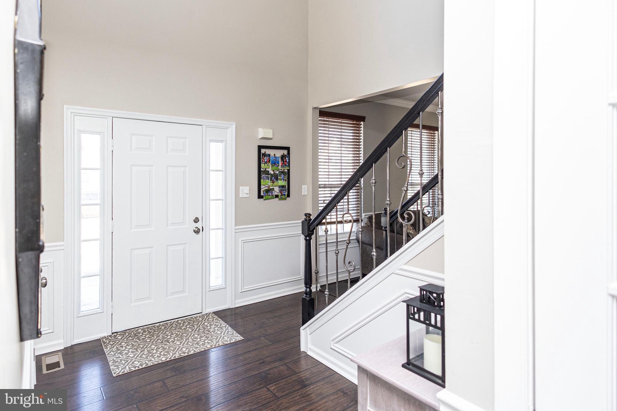 317 Pickwick Drive Williamstown, NJ 08094 - Photo 5 of 52 a view of entryway with wooden floor