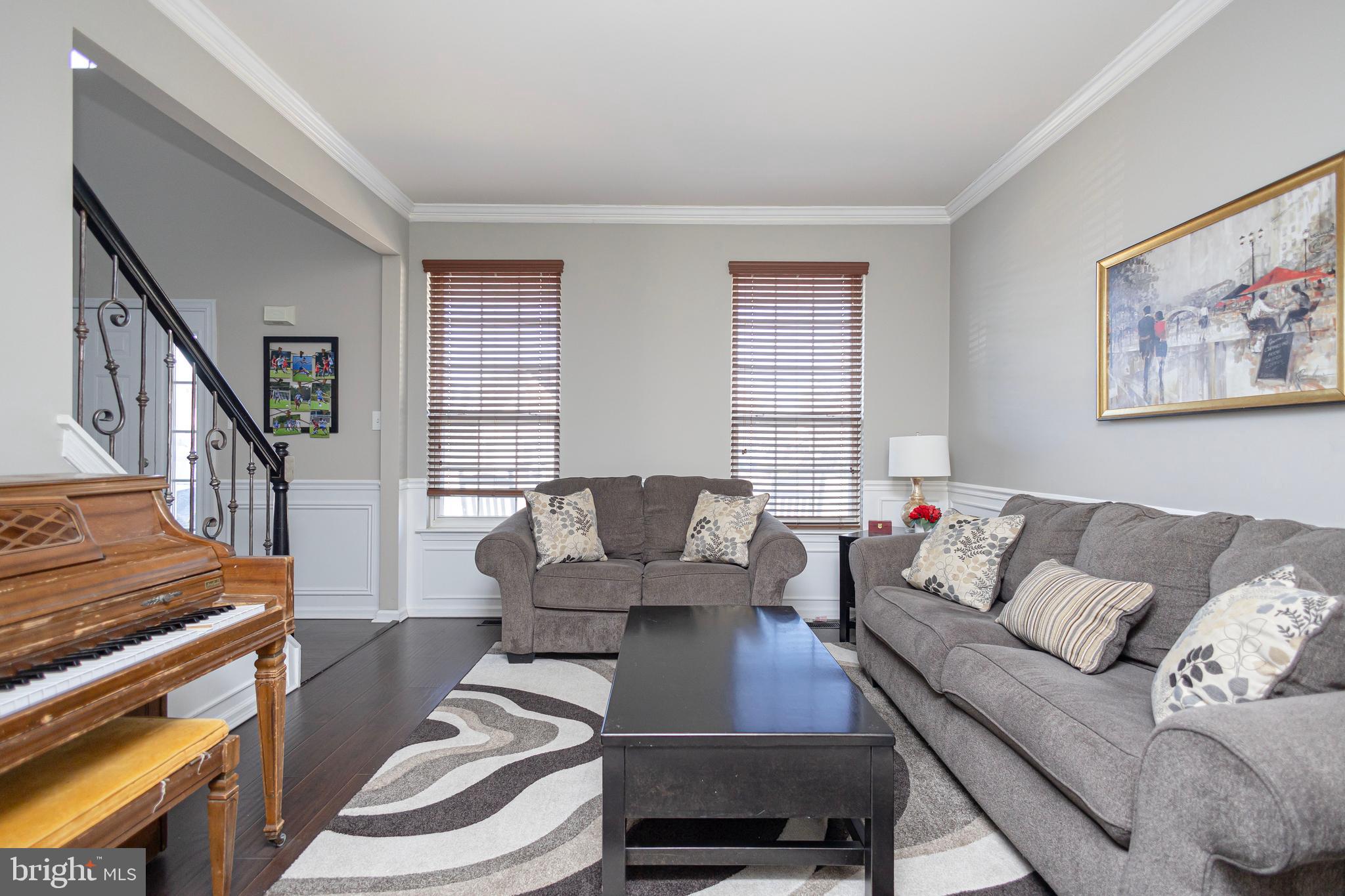 317 Pickwick Drive Williamstown, NJ 08094 - Photo 6 of 52 a living room with furniture and a potted plant