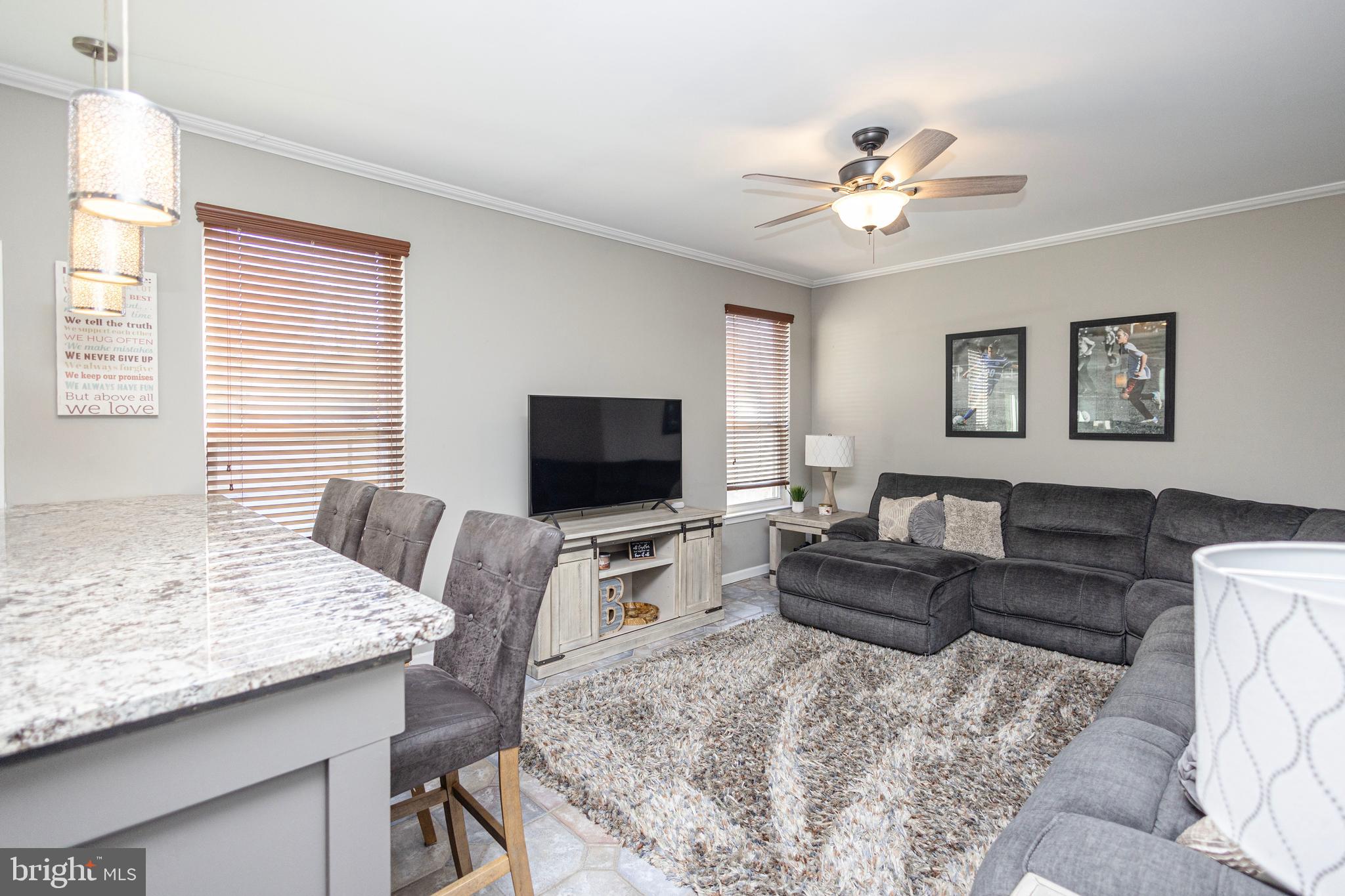 317 Pickwick Drive Williamstown, NJ 08094 - Photo 10 of 52 a bedroom with a bed and a flat screen tv