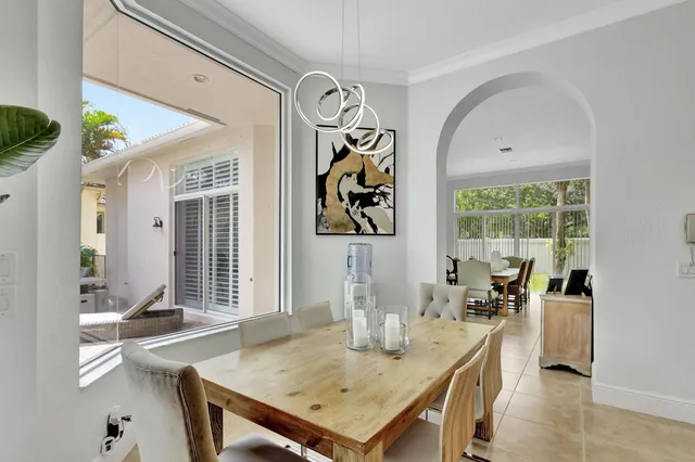 a bathroom with a granite countertop sink mirror and a shower