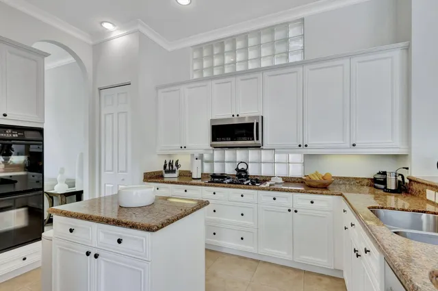 a bathroom with a sink and a washing machine