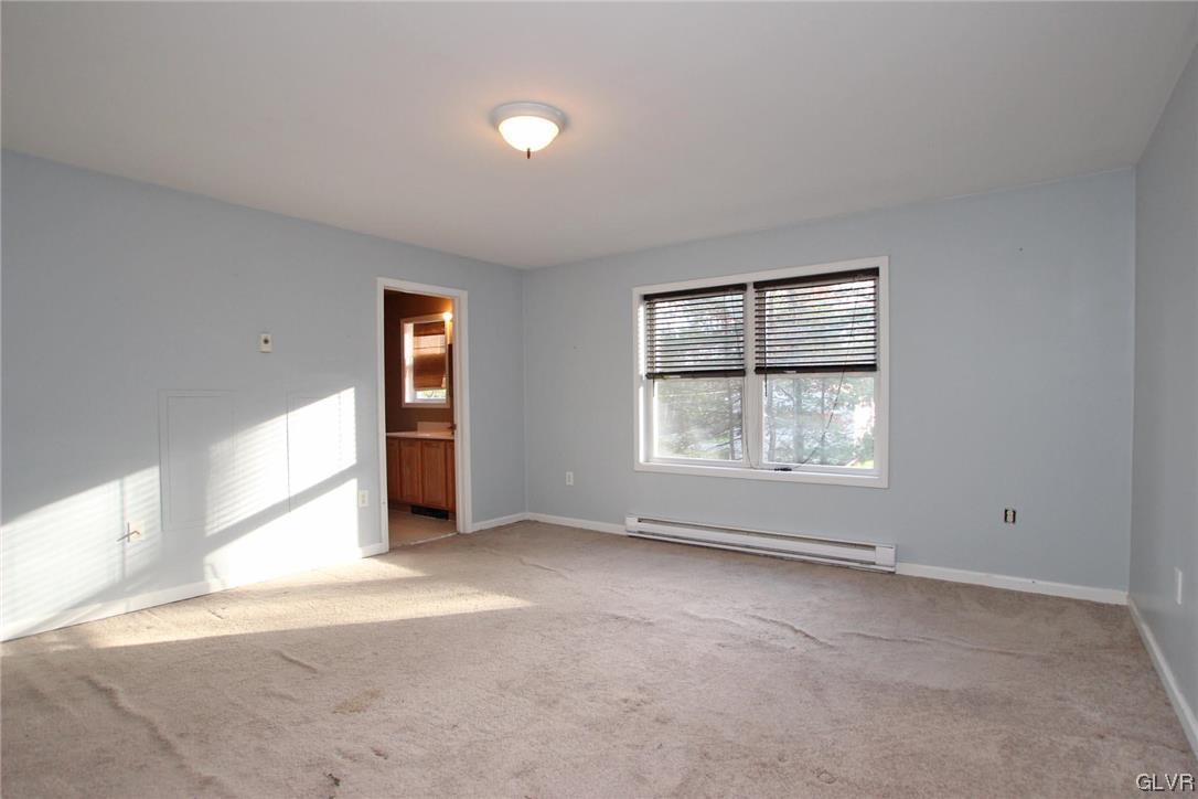 160 Spruce Drive Dingmans Ferry, PA 18328 - Photo 12 of 40 an empty room with windows