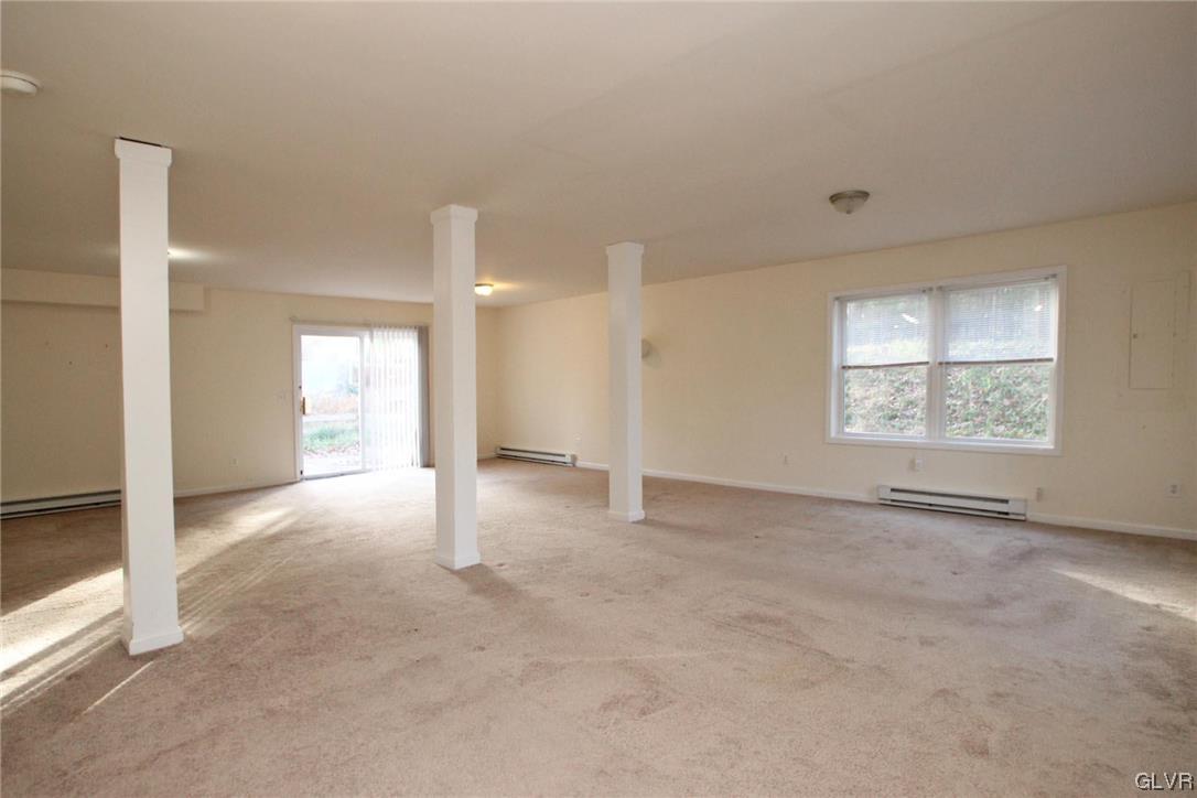 160 Spruce Drive Dingmans Ferry, PA 18328 - Photo 22 of 40 an empty room with windows