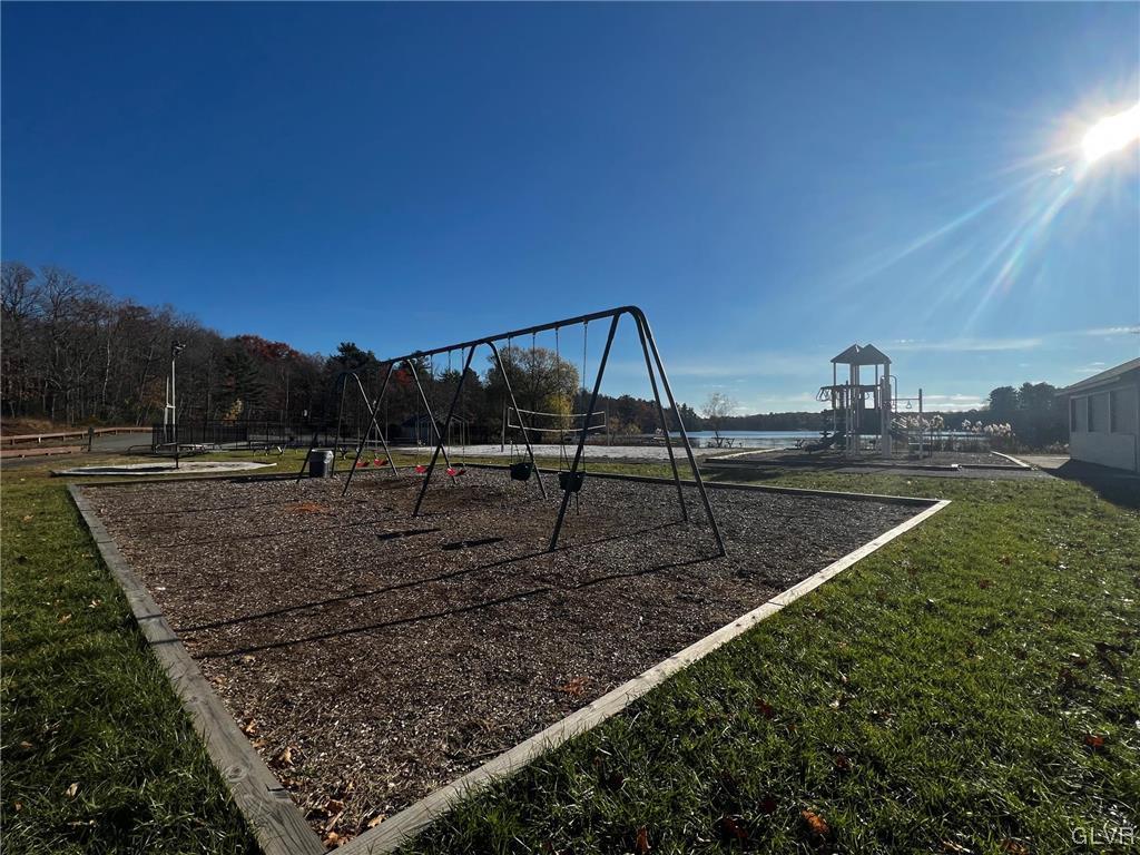 160 Spruce Drive Dingmans Ferry, PA 18328 - Photo 37 of 40 a view of a backyard