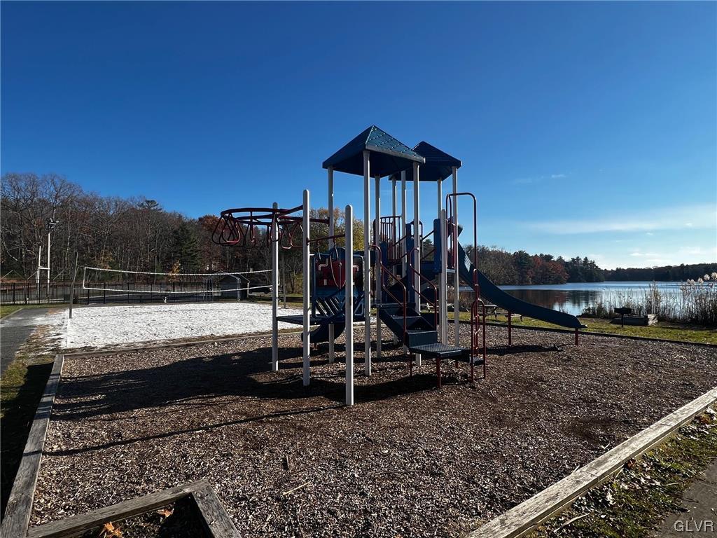 160 Spruce Drive Dingmans Ferry, PA 18328 - Photo 38 of 40 a view of a backyard with wooden fence