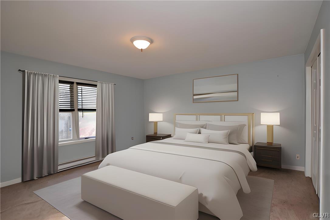 160 Spruce Drive Dingmans Ferry, PA 18328 - Photo 10 of 40 a bedroom with a bed and a window