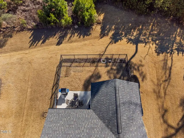 a view of a house with a tree
