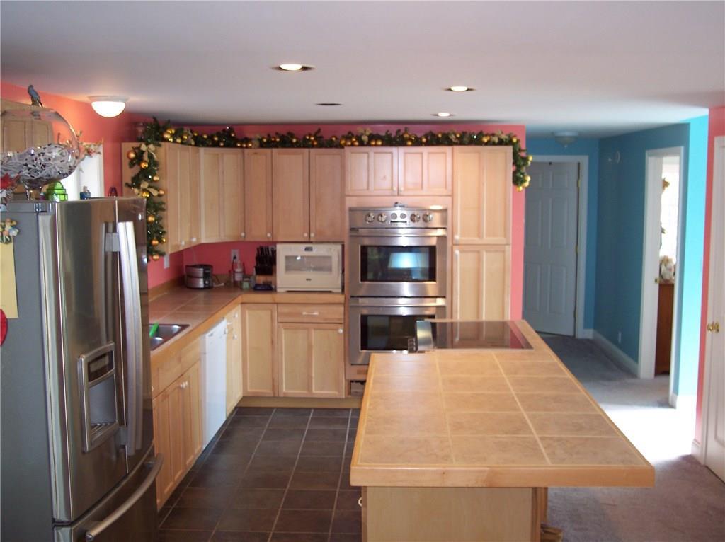 128 Bauneg Beg Road Sanford, ME 04073 - Photo 7 of 15 Kitchen w/ stainless steel appiances