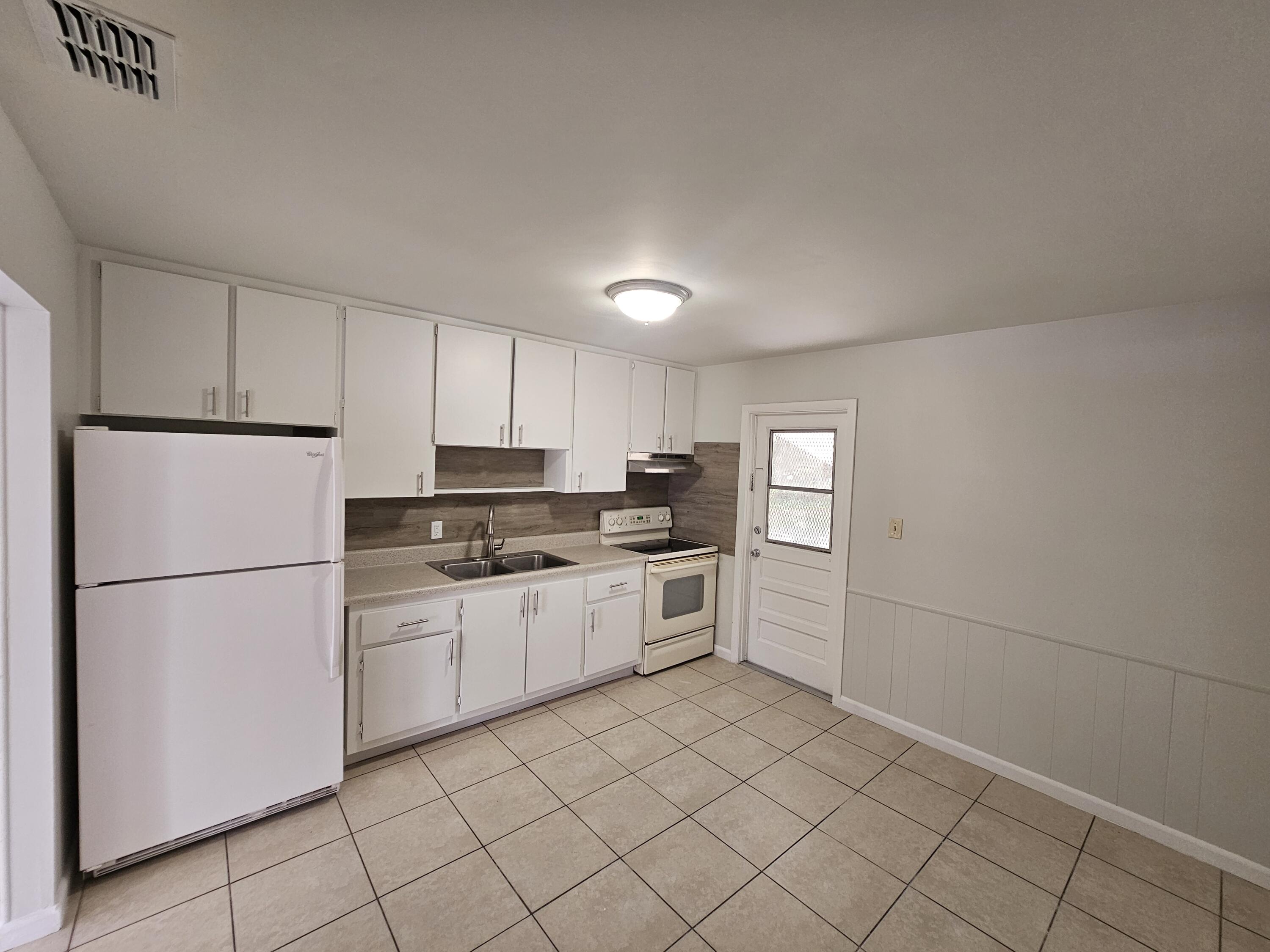 2031 Hugo Road Fort Pierce, FL 34946 - Photo 3 of 20 20260511_114834