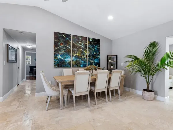a kitchen with stainless steel appliances granite countertop a sink and a granite counter tops