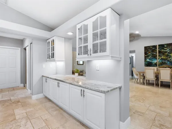 a bathroom with a sink and mirror
