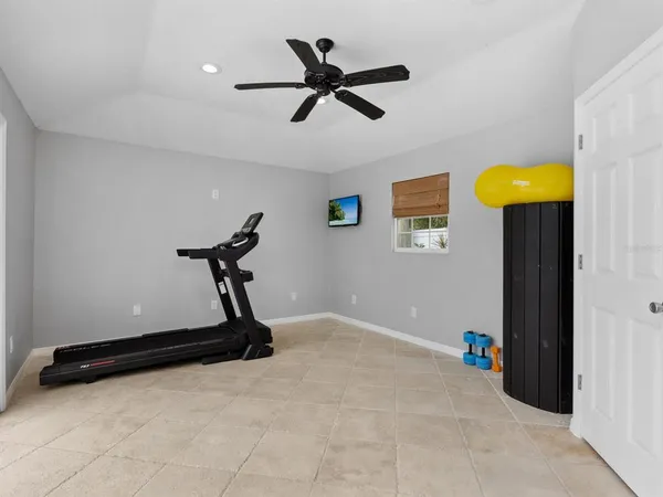a view of swimming pool with outdoor seating and city view