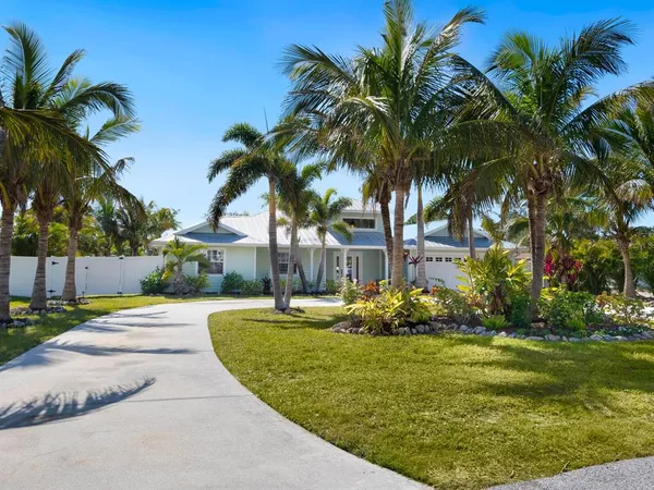 a front view of a house with swimming pool