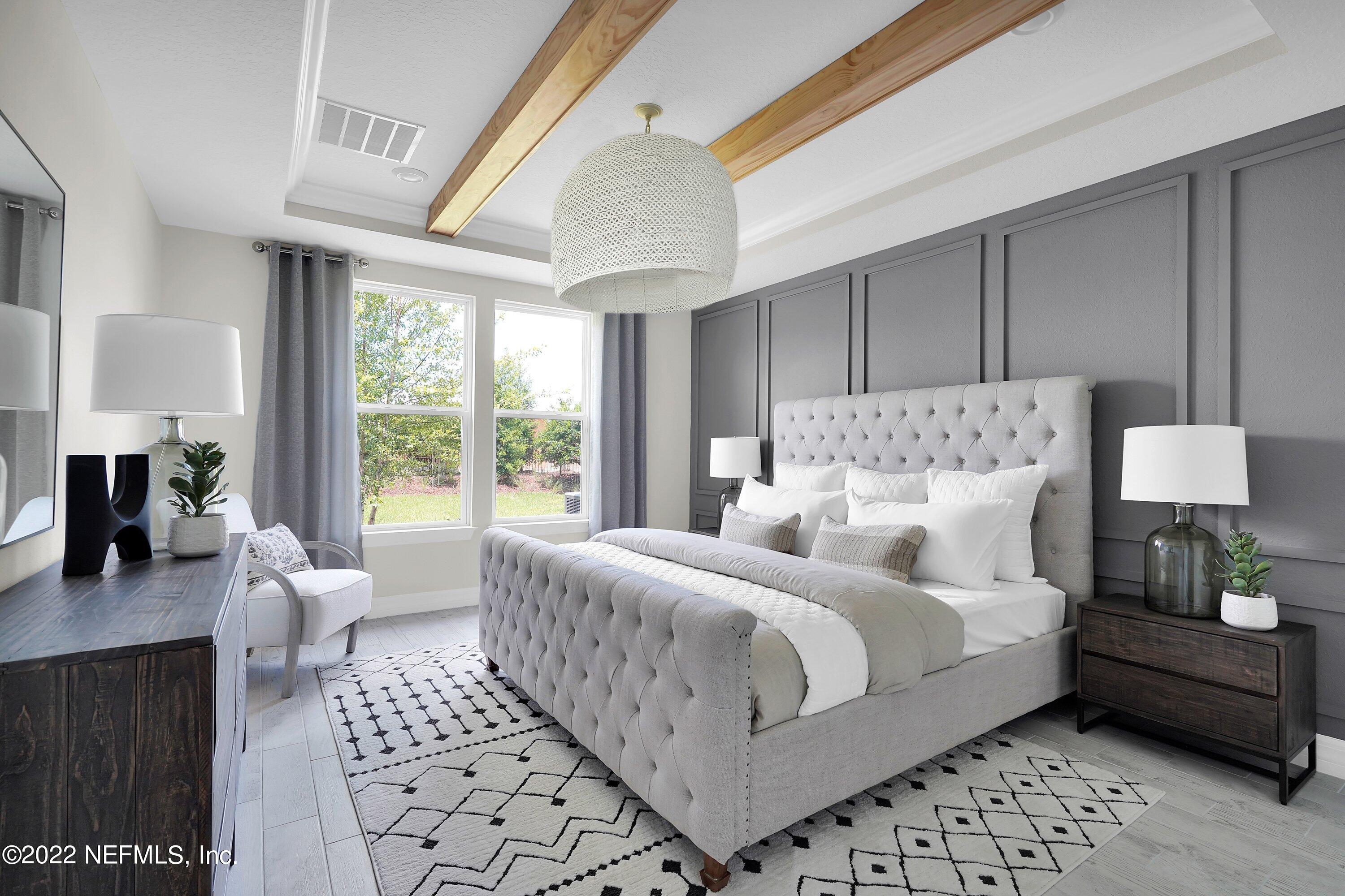 320 Del Webb Parkway Yulee, FL 32097 - Photo 11 of 16 a bedroom with bed and a window