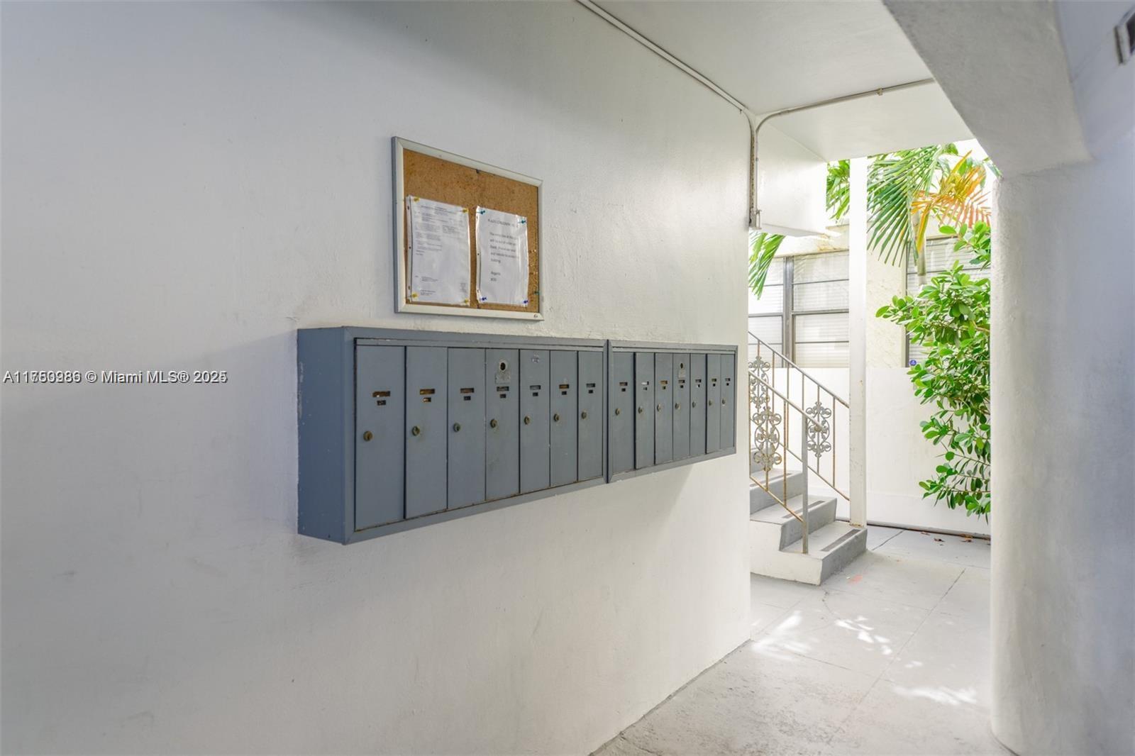 926 Michigan Avenue, Unit 12 Miami Beach, FL 33139 - Photo 12 of 14 a view of an entryway with wooden floor and windows