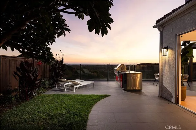 a view of a terrace with a garden