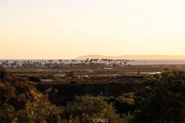 a view of lake and mountain