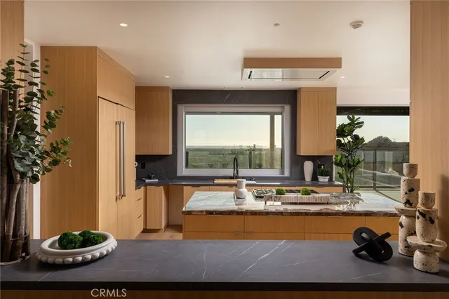 a view of a living room and dining room