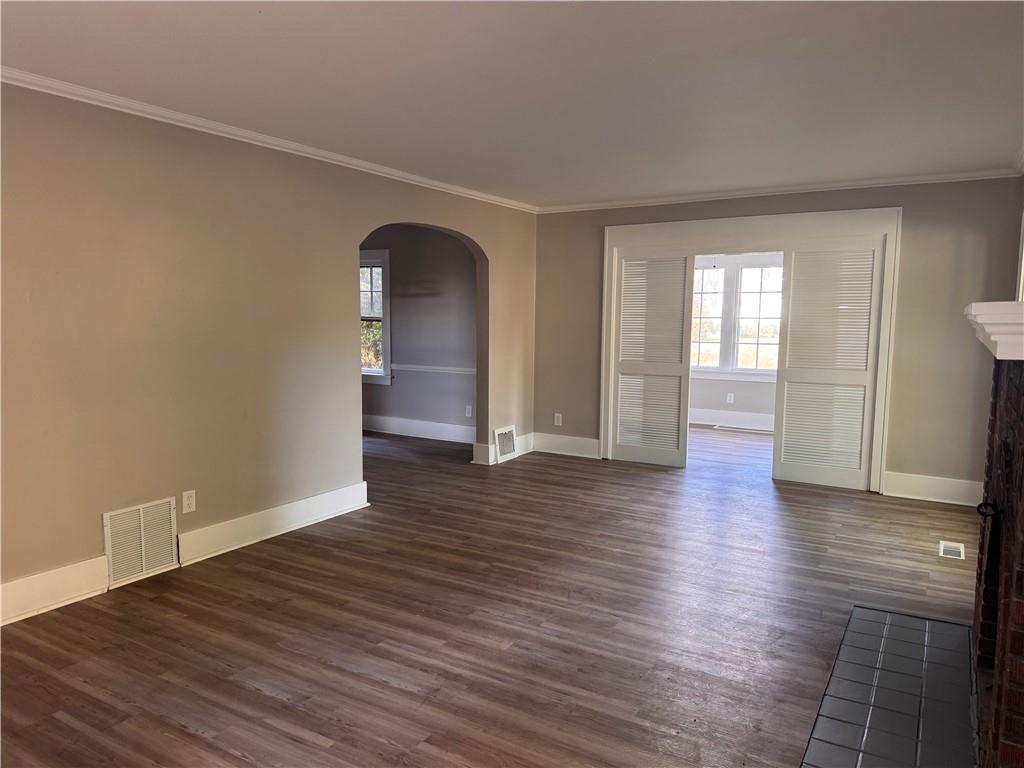 329 Norris Street Sharon, PA 16146 - Photo 4 of 19 a view of empty room with wooden floor and fan