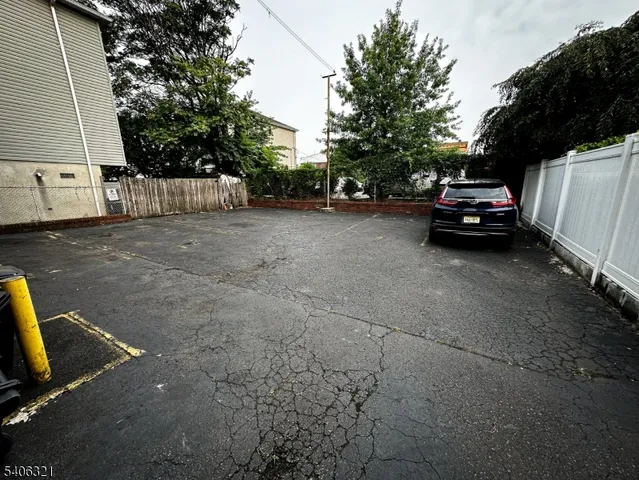 a view of a car parked on the side of the road