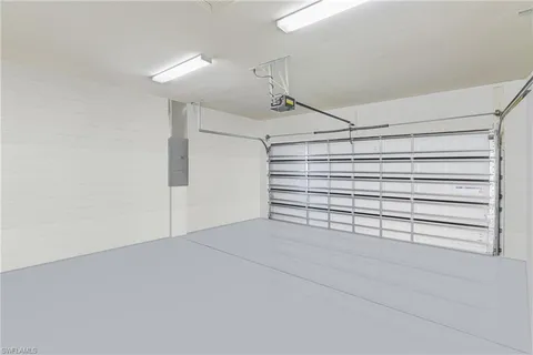 a view of an empty room with a windows