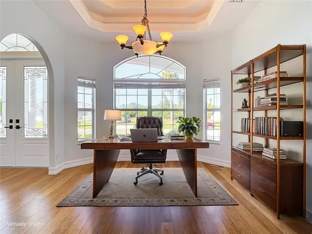 a kitchen with granite countertop a sink and cabinets