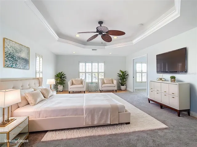 a very nice looking living room with furniture and a window