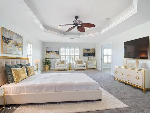 a spacious bathroom with a granite countertop sink a mirror and a shower