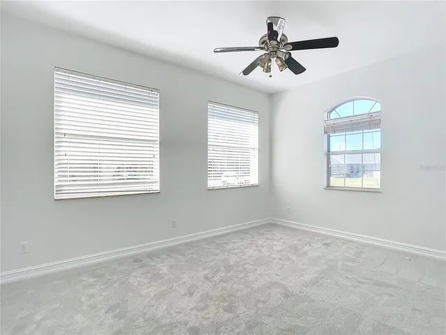 a bathroom with a sink a vanity and a mirror