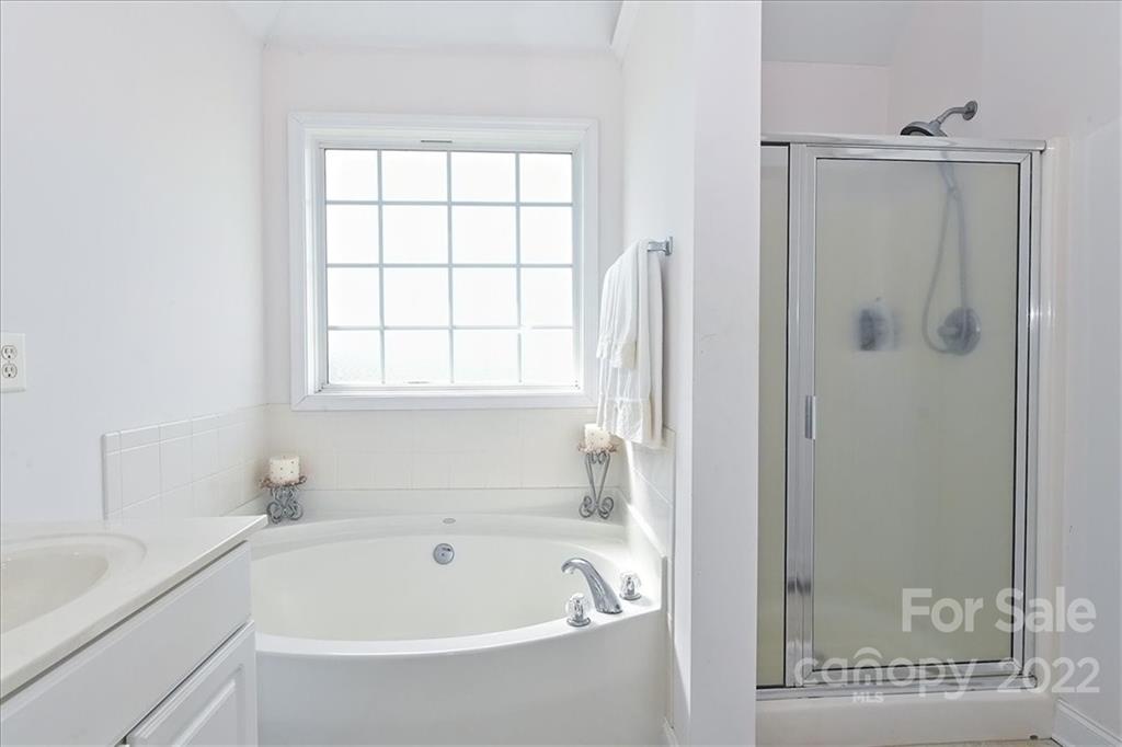 3708 Zebulon Williams Road Monroe, NC 28110 - Photo 26 of 48 a white bath tub sitting next to a white sink