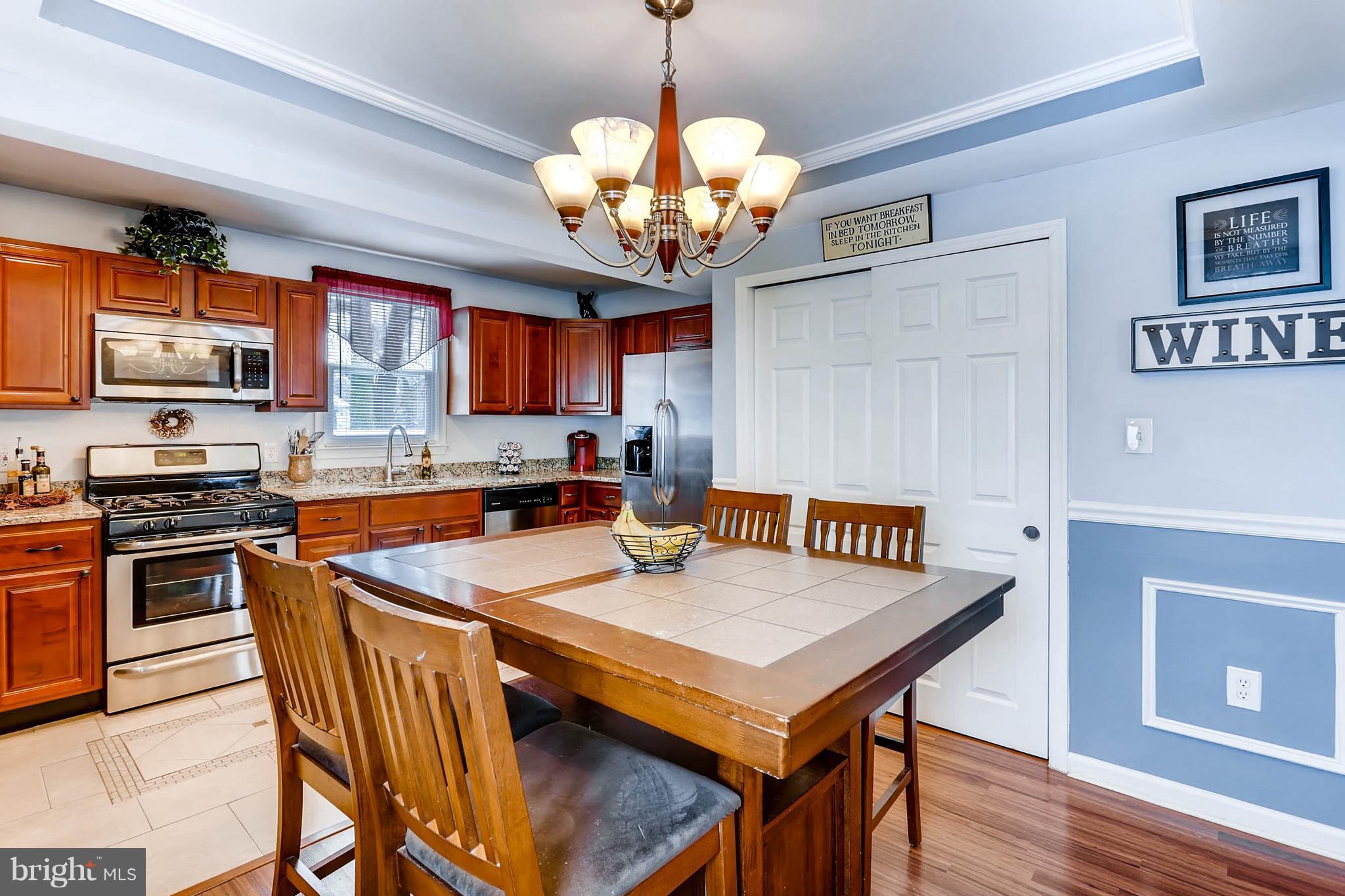 8645 Oakleigh Road Baltimore, MD 21234 - Photo 8 of 28 Dining room/kitchen space