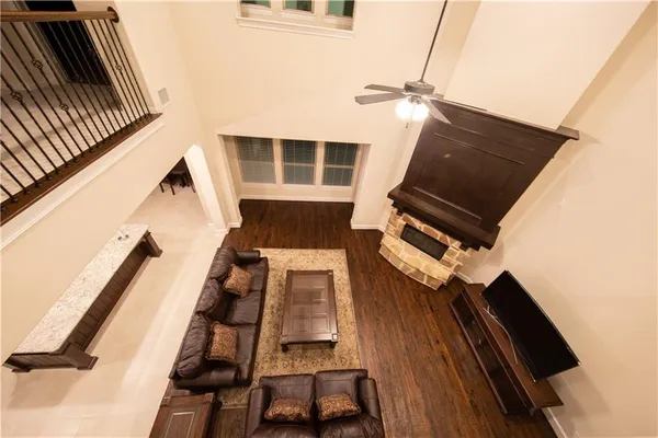 a view of balcony with wooden floor