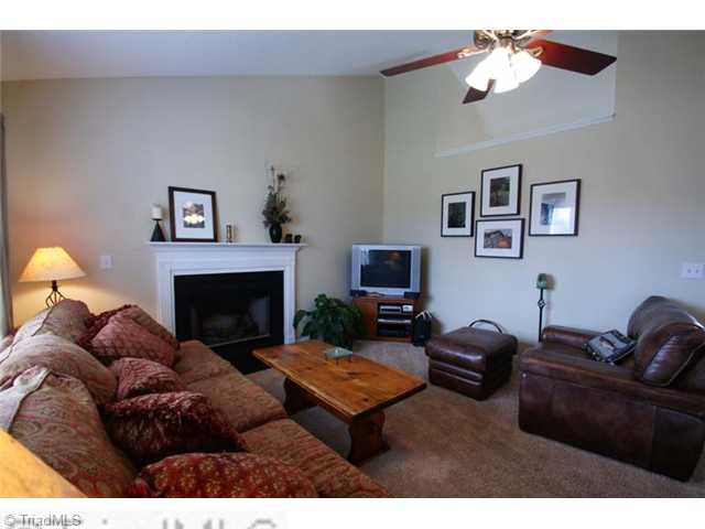 5091 Windsbury Ridge Road Clemmons, NC 27012 - Photo 3 of 12 Living Room. Neutral carpet and paint allow you to move right in!