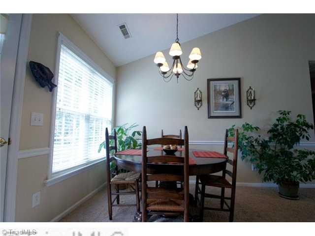 5091 Windsbury Ridge Road Clemmons, NC 27012 - Photo 4 of 12 Dining Room. This dining room overlooks the backyard.