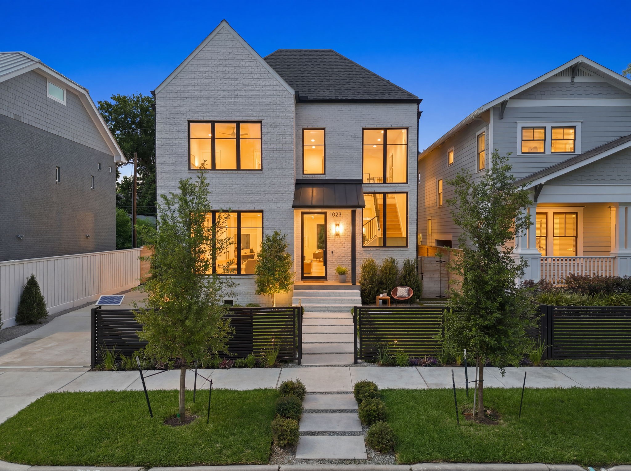 1023 Euclid Street Houston, TX 77009 - Photo 1 of 50 Beautifully designed Woodland Heights residence showcasing timeless curb appeal and sophisticated modern finishes.