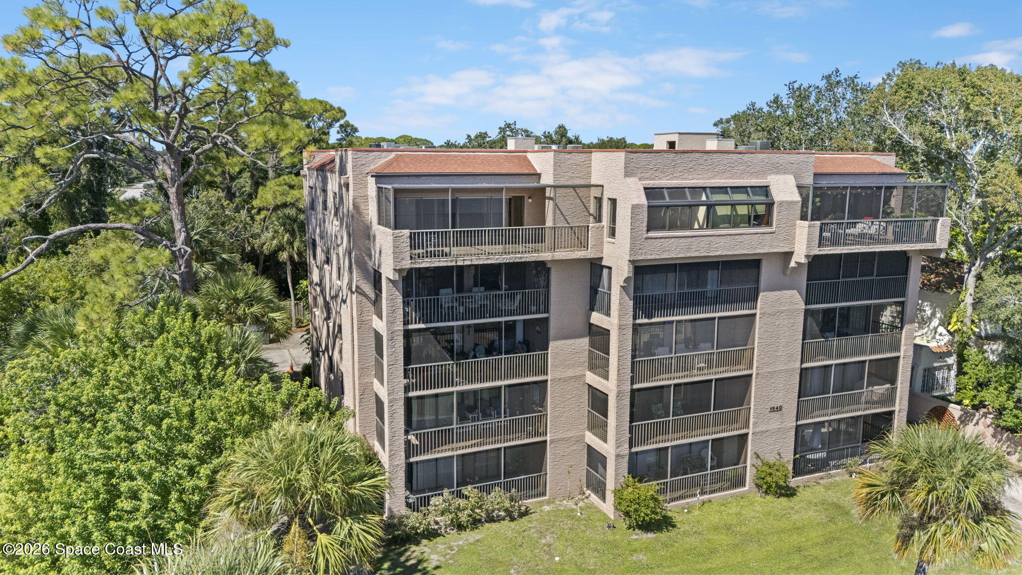1540 Riverside Drive, Unit 12 Titusville, FL 32780 - Photo 2 of 34 32-web-or-mls-RIVERSIDE_DRONE4