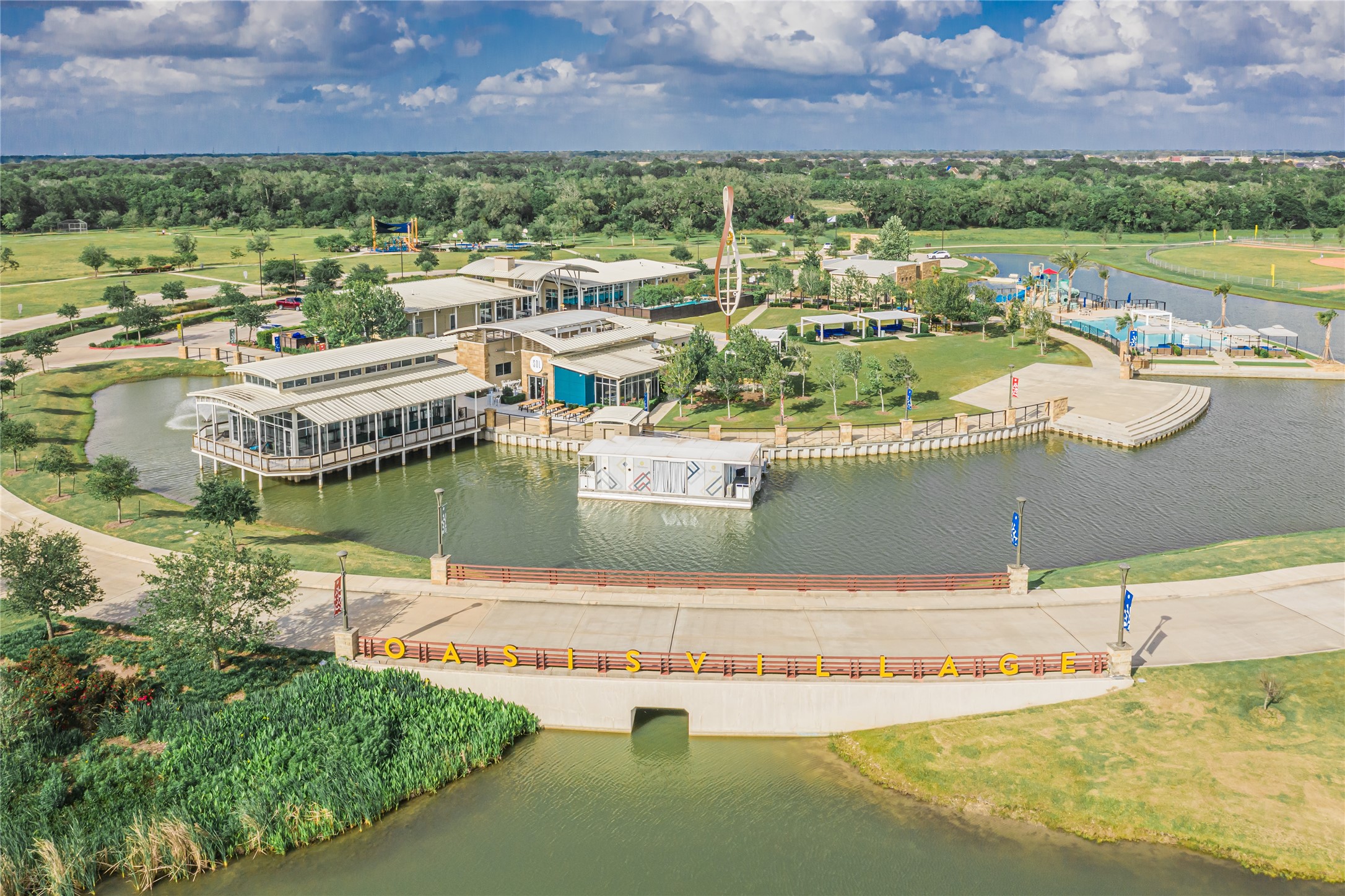 4946 Hitchings Court Rosharon, TX 77583 - Photo 34 of 49 Oasis Village: This is just one of the many amenities in the subdivision, featuring a family pool, kiddie pool, outdoor games, boathouse, conservatory, adult pool, gym, and much more.