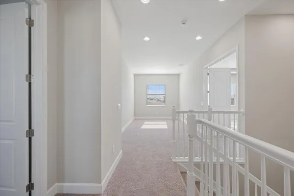 a view of hallway with stairs