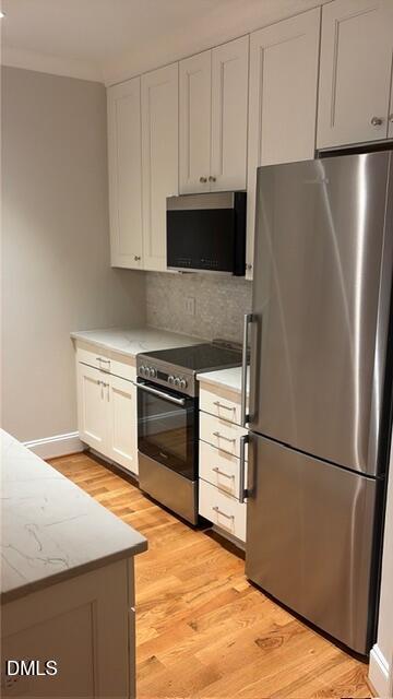 607 Smedes Place, Unit B Raleigh, NC 27605 - Photo 10 of 16 Fully Equipped Kitchen