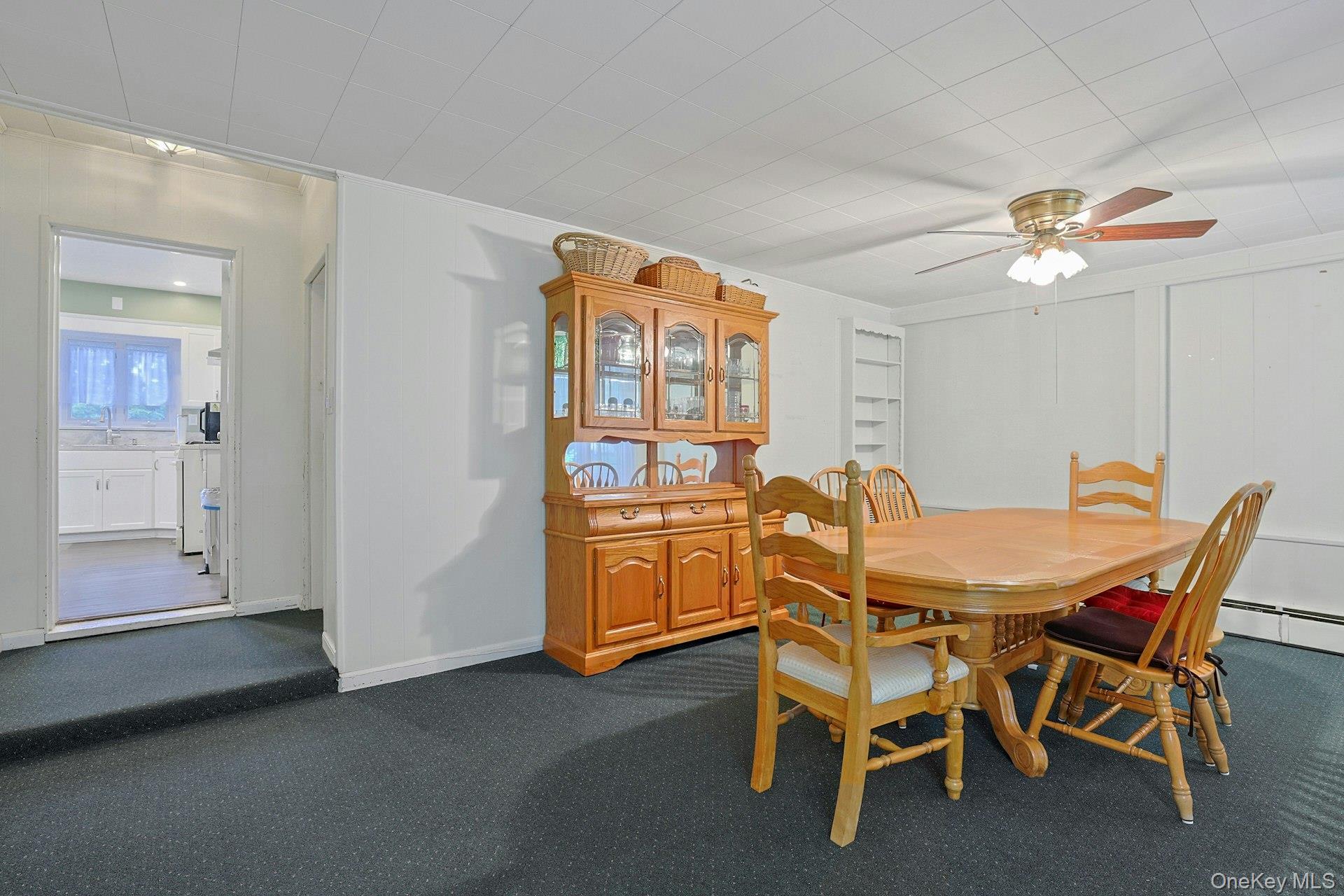 31 Townline Road Pearl River, NY 10965 - Photo 13 of 27 a dining room with furniture and chandelier