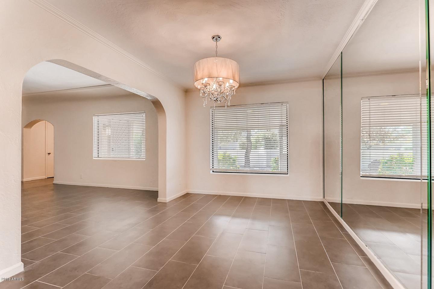 102 West Thunderbird Road Phoenix, AZ 85023 - Photo 23 of 38 Dining Room into Front room